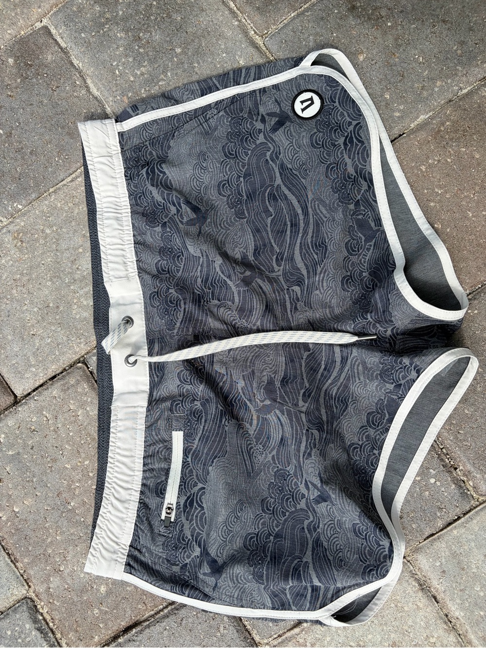 Vuori womens Charcoal Wave-Print Athletic Shorts with White Trim